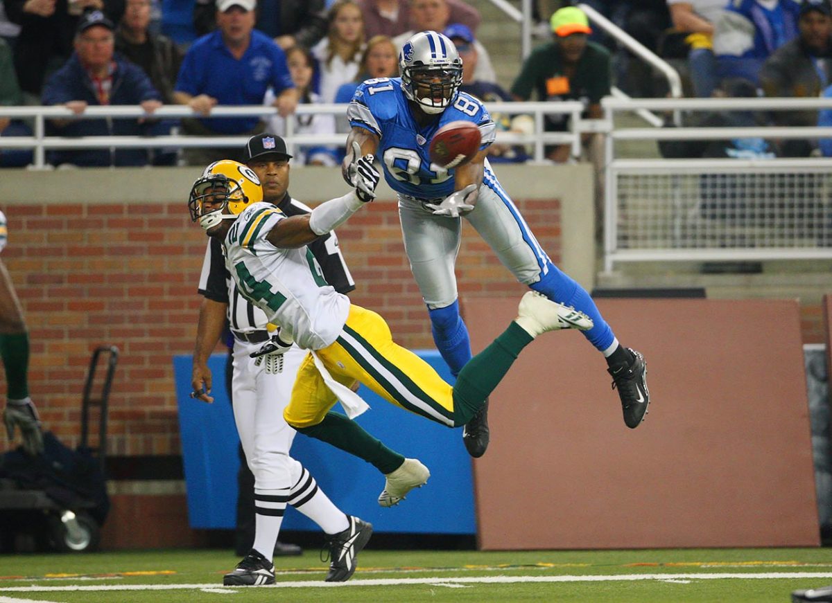 2007-1122-Calvin-Johnson-Jarrett-Bush-075879379.jpg